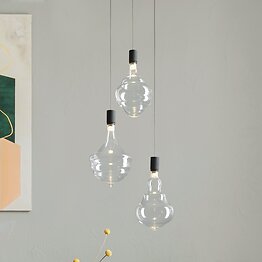 3-light pendant in transparent borosilicate blown glass with black metal canopy.