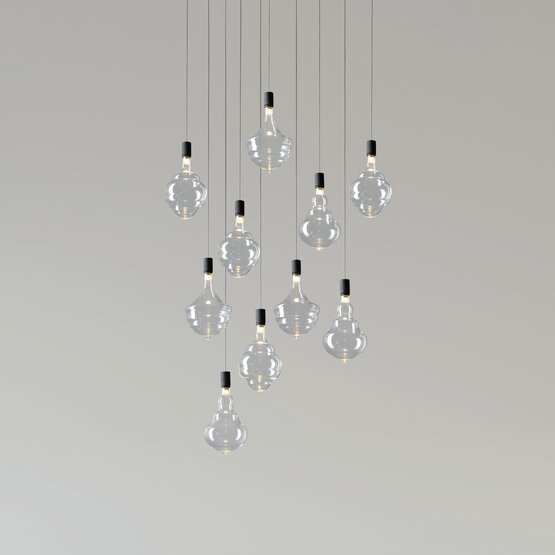 Sospensione Honey Black - Sospensione a 10 luci in vetro soffiato borosilicato trasparente con rosone in metallo nero. Versione a 10 luci con diversi assemblaggi. LED 47,7W - 500 mA
3000°K / 3816 lumen.