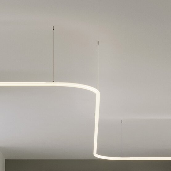 Linea suspended light, Led suspension light 90 degrees curved in opal white silicone with steel structure